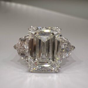 5.10 carat E VVS2 emerald cut lab diamond with Cadillac side engagement ring